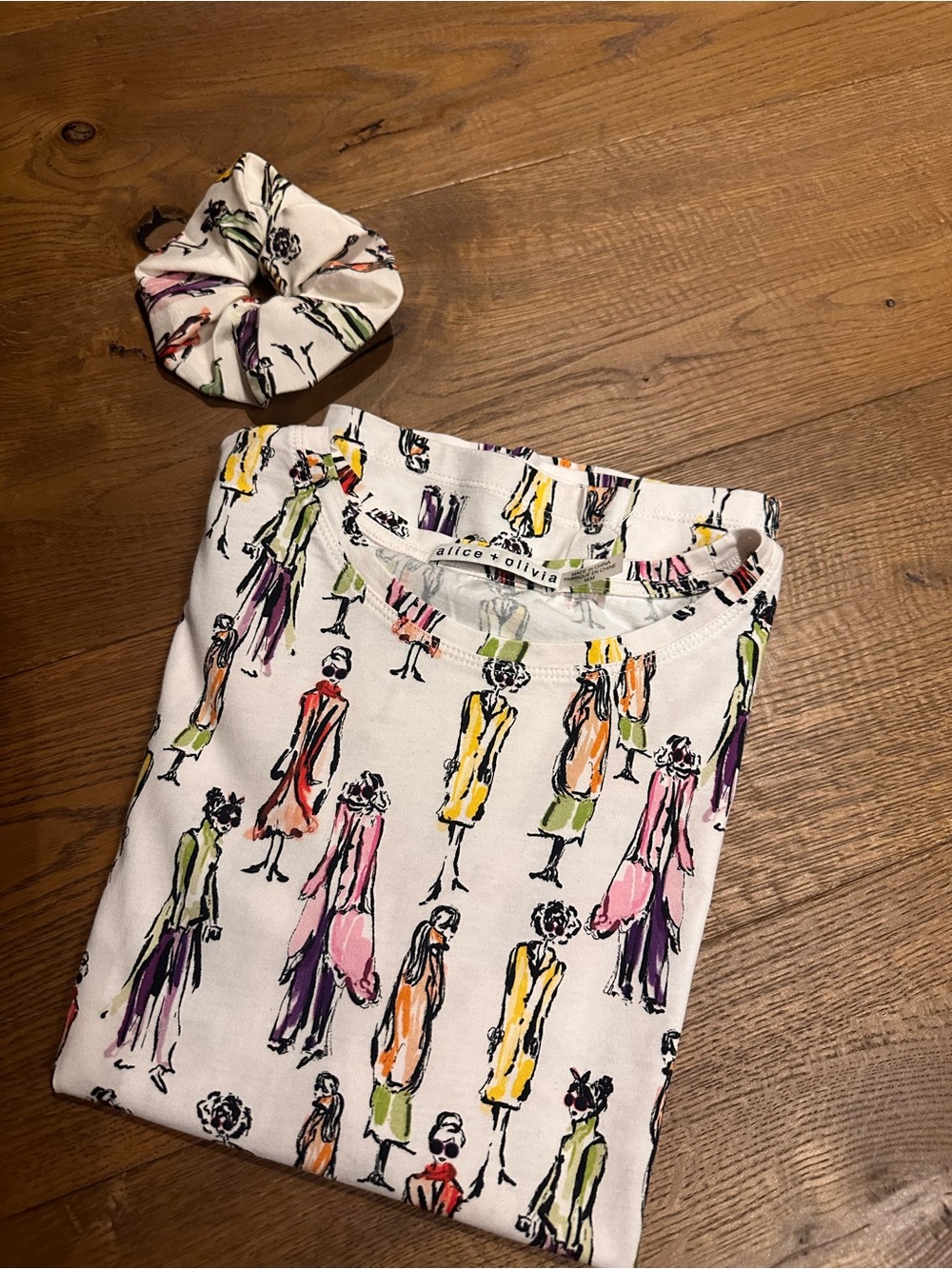 Alice + Olivia White Tee with Multicolor Figure Print